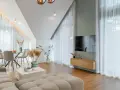 Przytulny salon z sofą w kolorze kremowym, stołem i krzesłami, ozdobiony trawami pampasowymi.