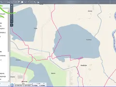 Mapa ewidencyjna z widocznymi granicami działek, budynkami i hydrografią. Widoczne nazwy miejscowości: Kwiatków, Koźminek, Janiszew.